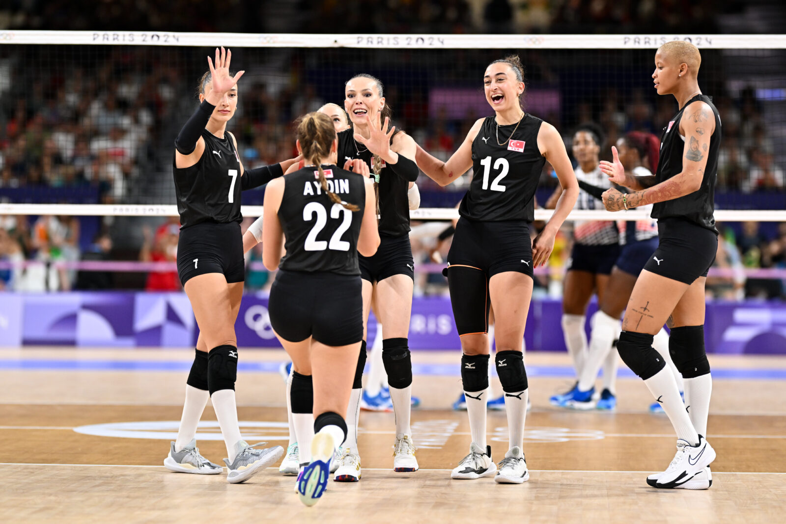 Türkiye's national women's volleyball team celebrates after defeating the Dominican Republic at the Paris 2024 Olympics, France, Aug. 1, 2024. (AA Photo)